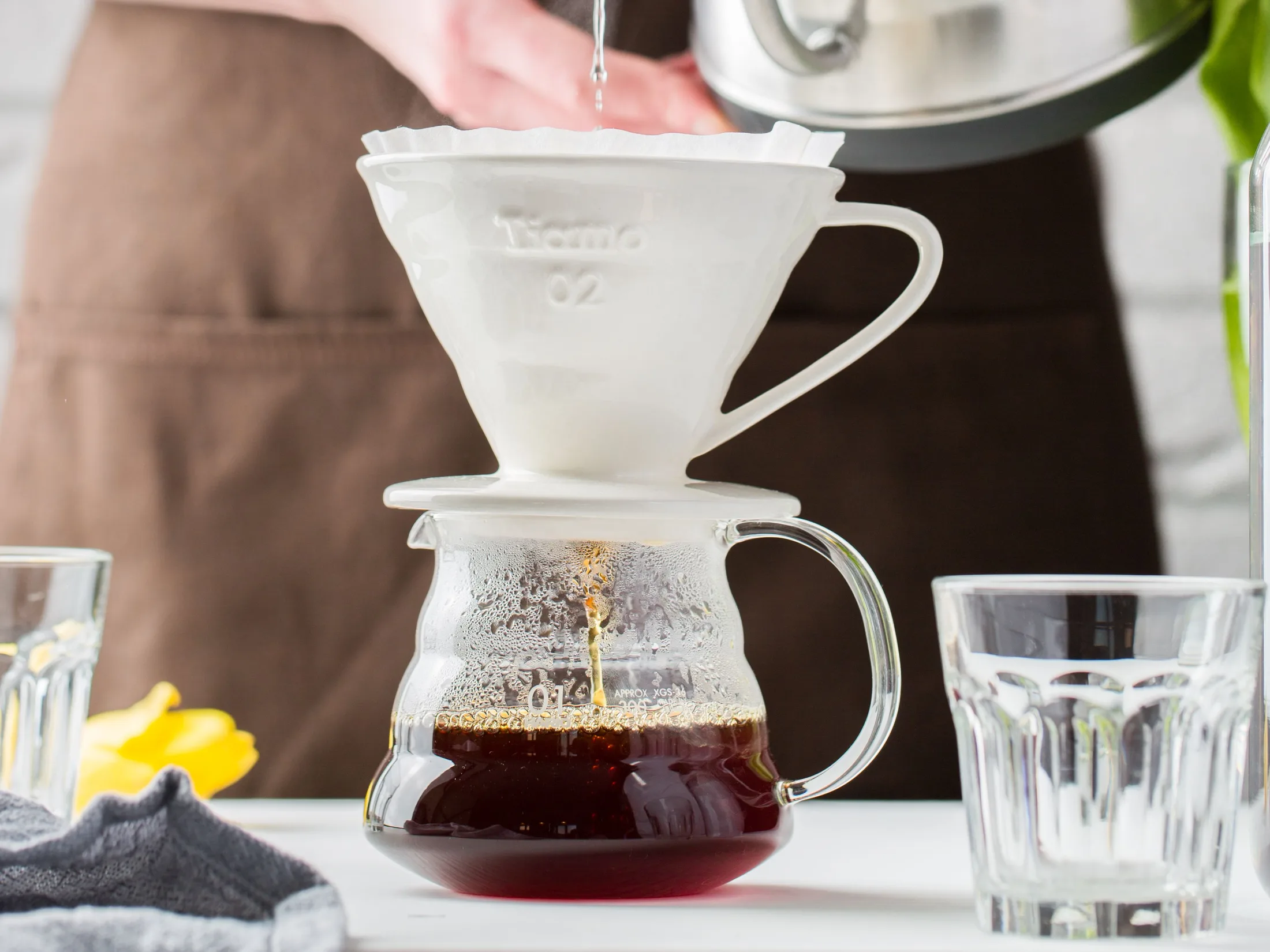Pour-over coffee brewing on a home counter